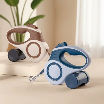 Laisse enrouleur chien versions beige et bleue pour s'adapter aux préférences de chaque propriétaire